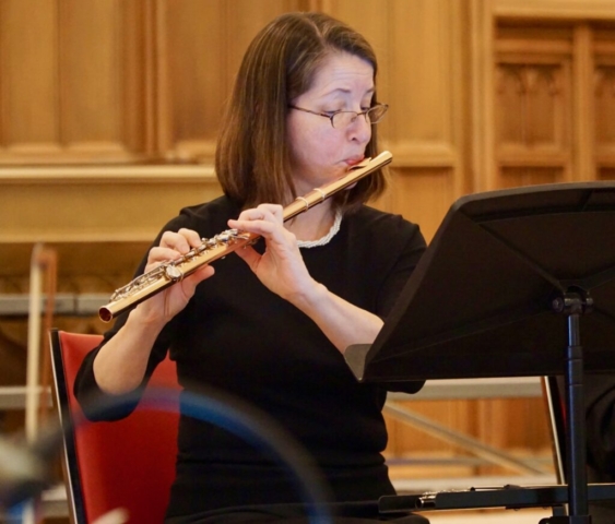 Pamela Taylor playing her golden John Lunn flute